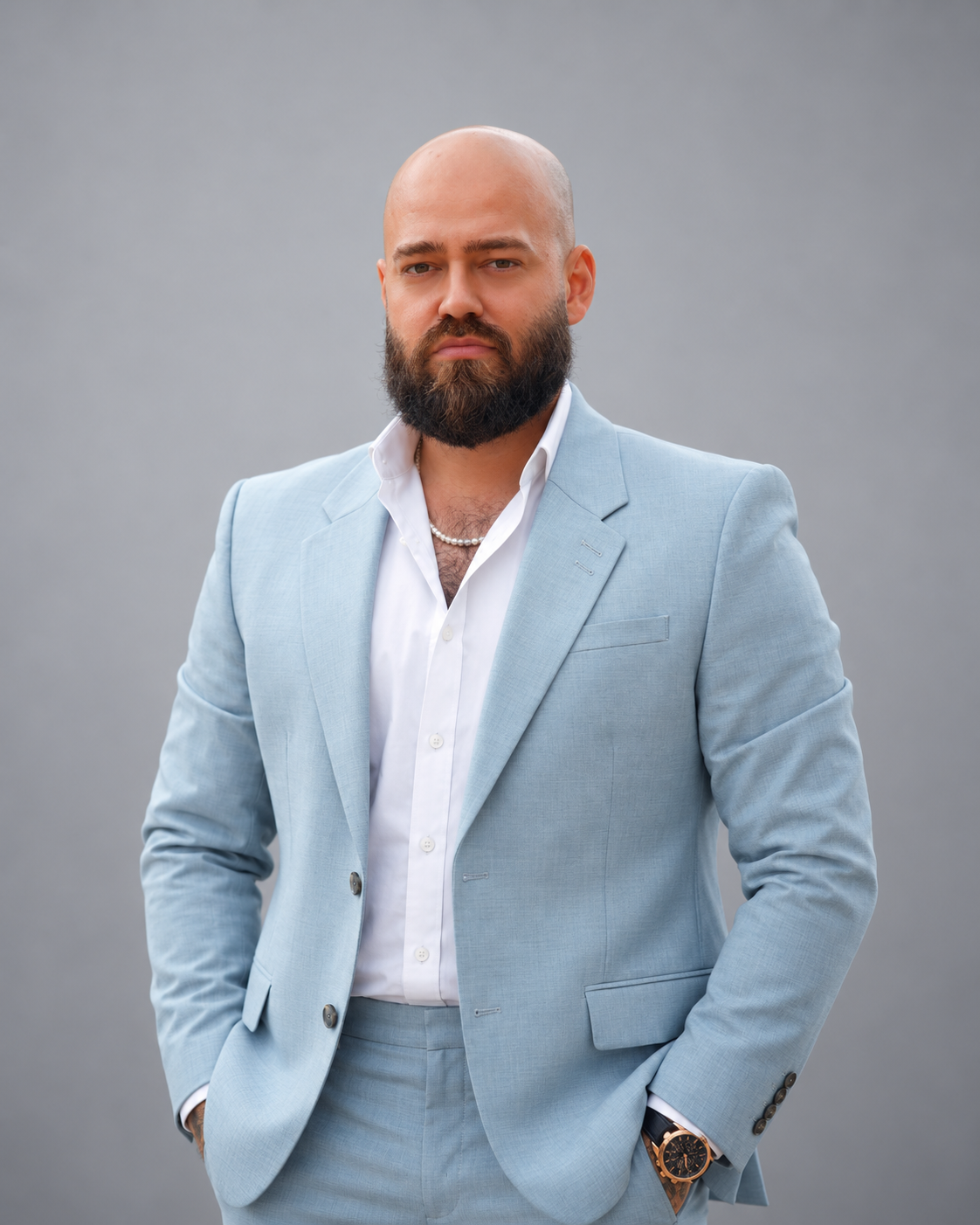 Eduard, your consultant, wearing a pale blue suit